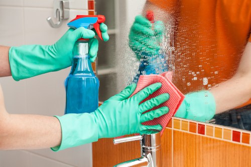 Cleaning specialist reviewing a customer booking and service details